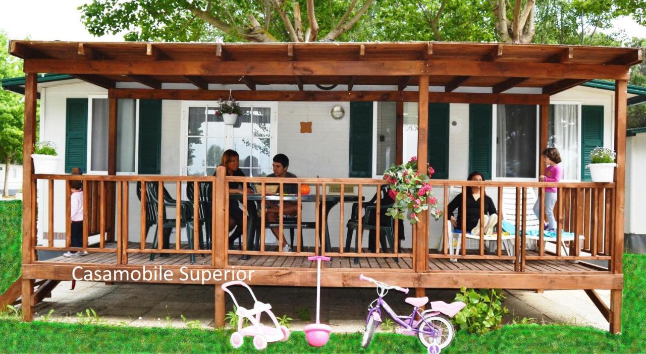 Camping Village Punta Navaccia ตัวโร ซุล ตราซิเมโน ภายนอก รูปภาพ